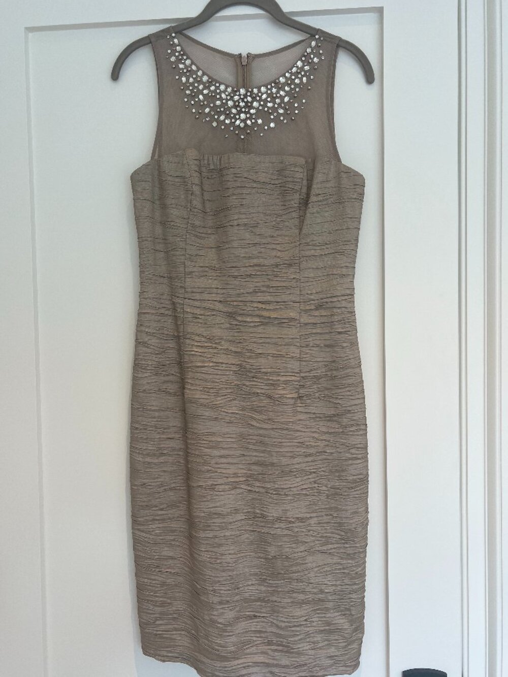 Eliza J Gold with rhinestone collar